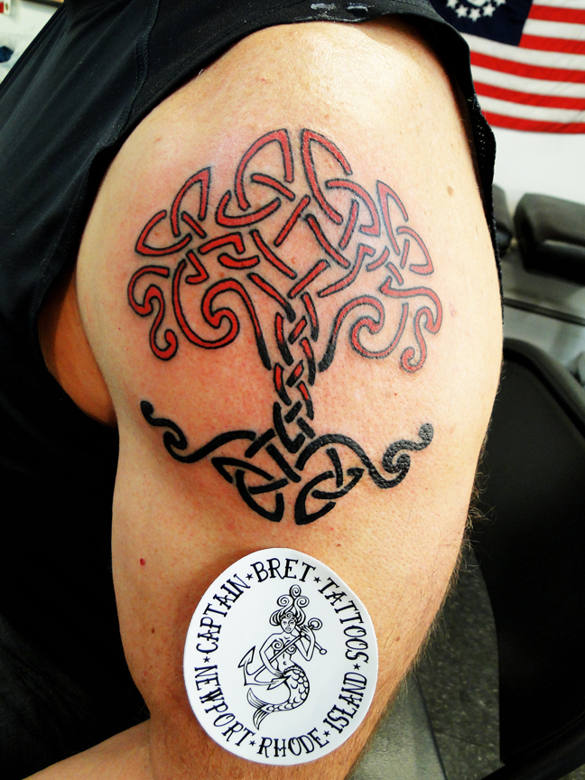celtic spine tattoos for men